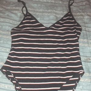 blue, red and white striped bodysuit.